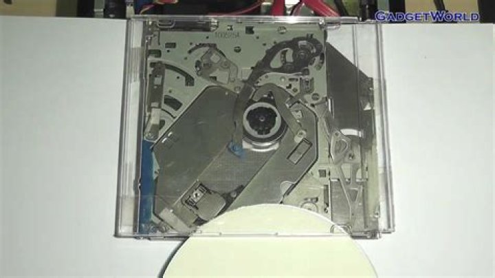 How does a slot loading CD drive work?
